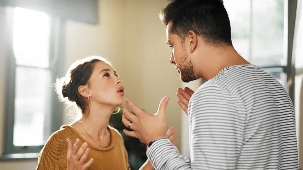 Relationship Conflict A man and woman arguing gently